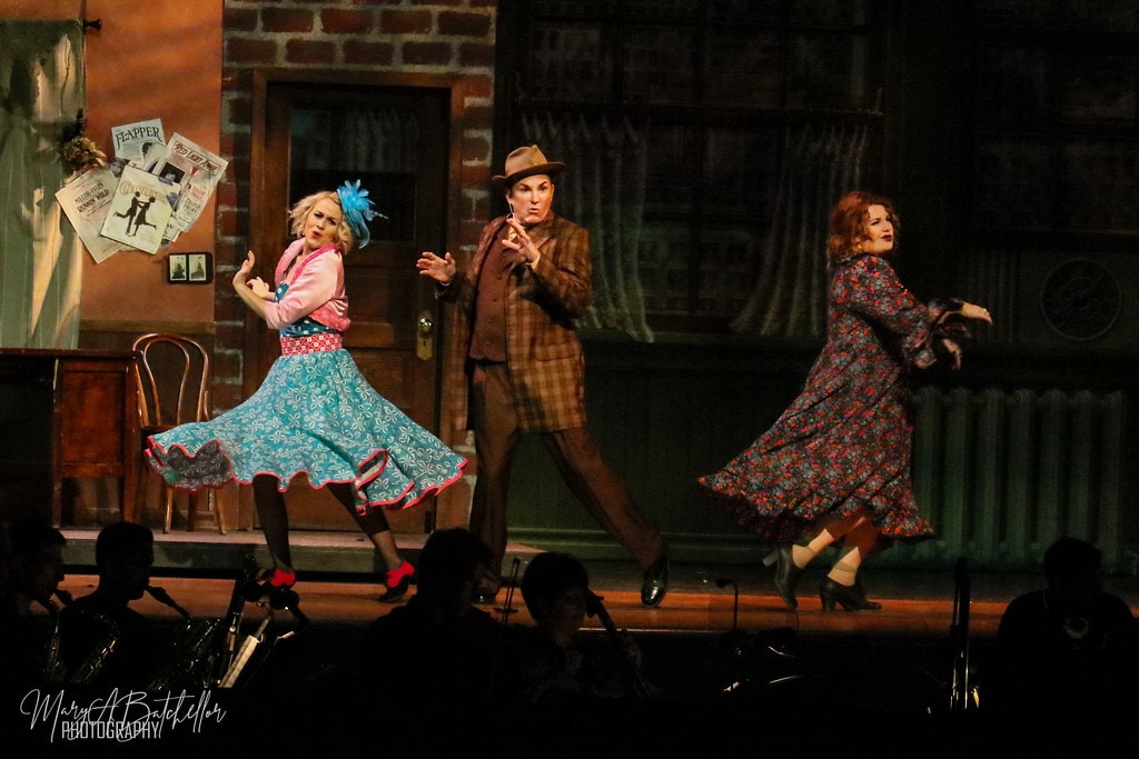 Annie — Lily St. Regis, Rooster, and Miss Hannigan perform a lively trio in the orphanage apartment set