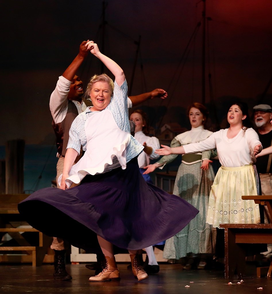 Nettie dancing with ensemble at the harbor — Carousel