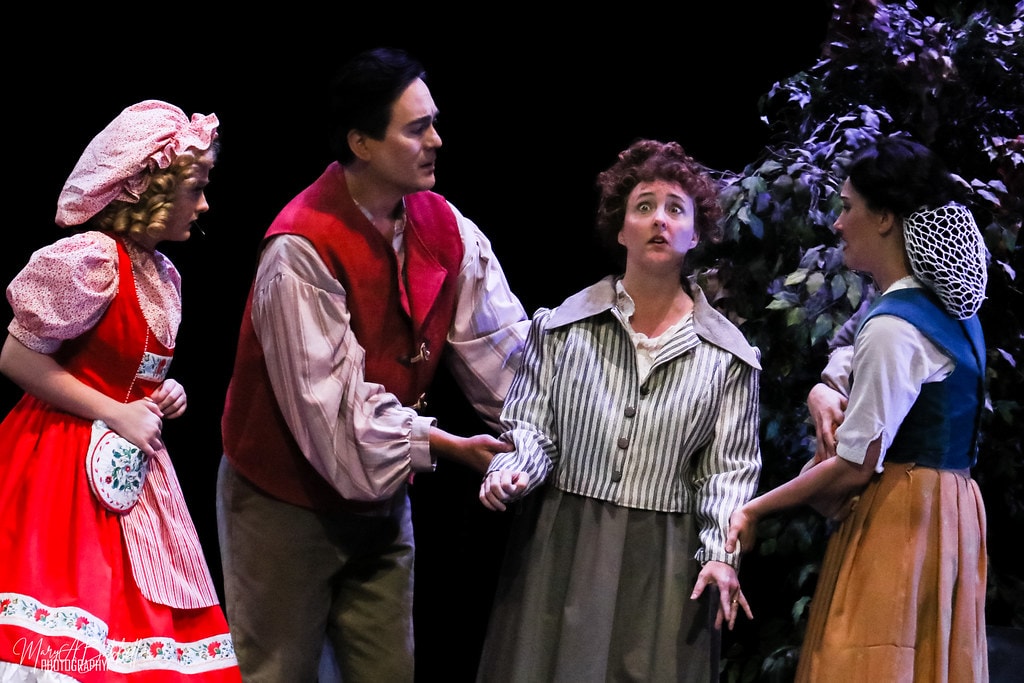 Into the Woods — Little Red Riding Hood, the Baker, the Baker's Wife, and Cinderella in a four-person scene in the forest