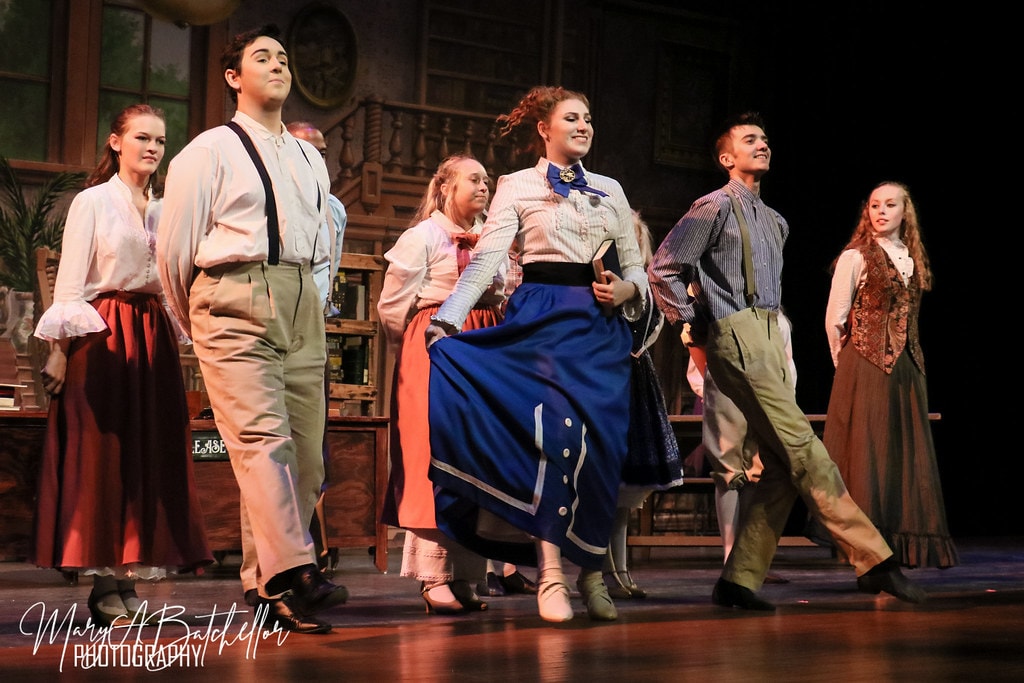 The Music Man — six River City townspeople walk in a processional
