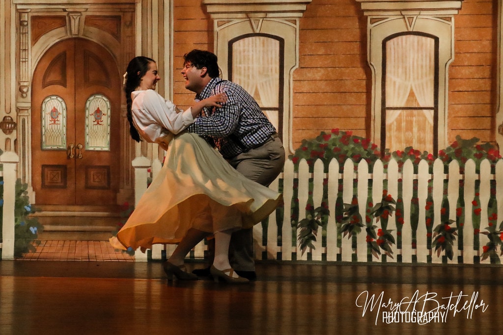 The Music Man — a couple laughs and dances together
