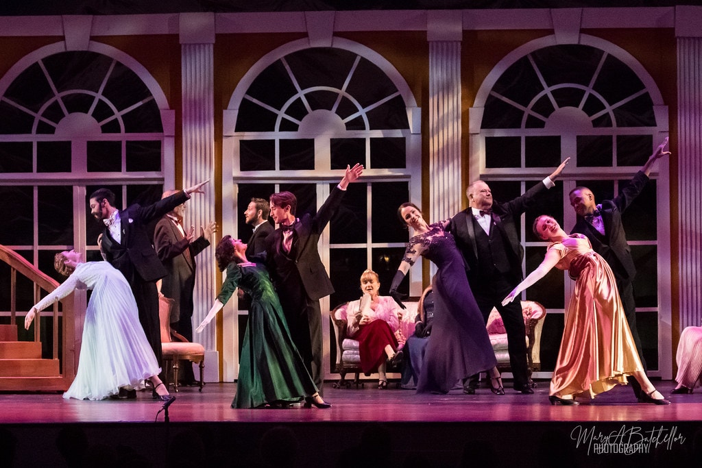 The Sound of Music — full adult ensemble performing an elegant ballroom dance