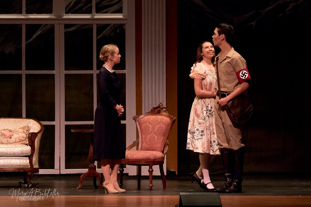 The Sound of Music — Elsa Schraeder faces Liesl and Rolf in the von Trapp parlor
