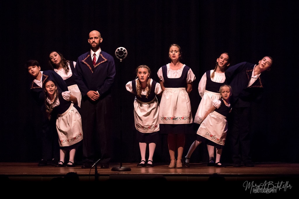 The Sound of Music — Captain von Trapp and von Trapp children in folk costumes