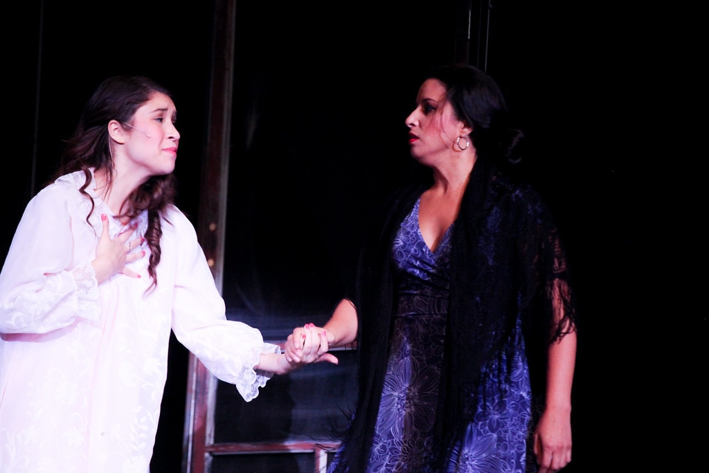 Theatrical cast performing musical number — West Side Story
