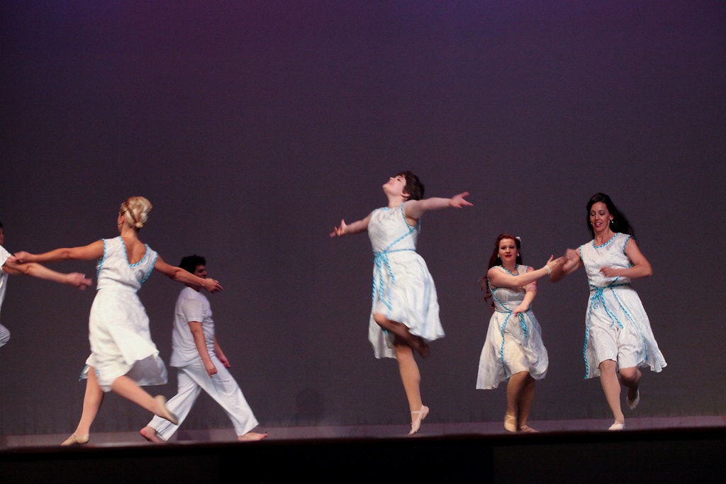 Cast performing on stage — West Side Story