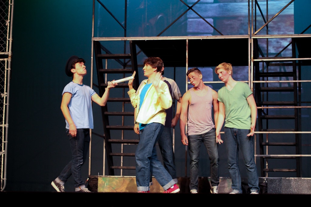 Theatrical cast on stage — West Side Story